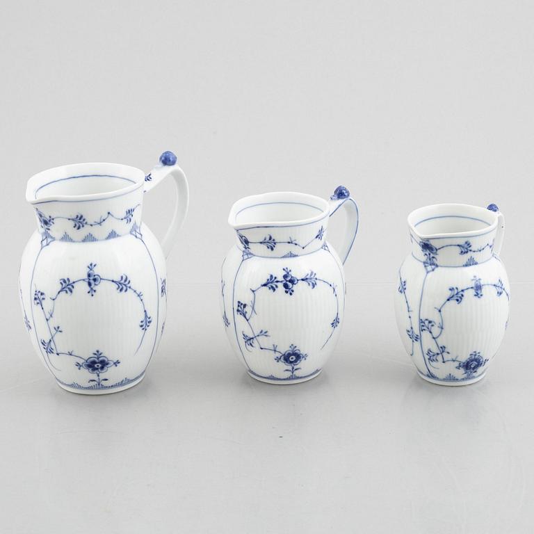 Three 'Blue Fluted' / 'Musselmalet' porcelain milkjugs, Royal Copenhagen, model 159, 450, 459, 1893-1900 and later.