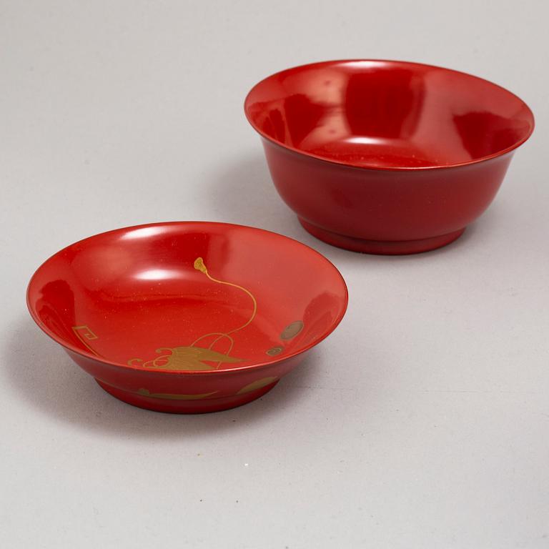 Eight lacquered bowls with covers, Japan, 20th century.