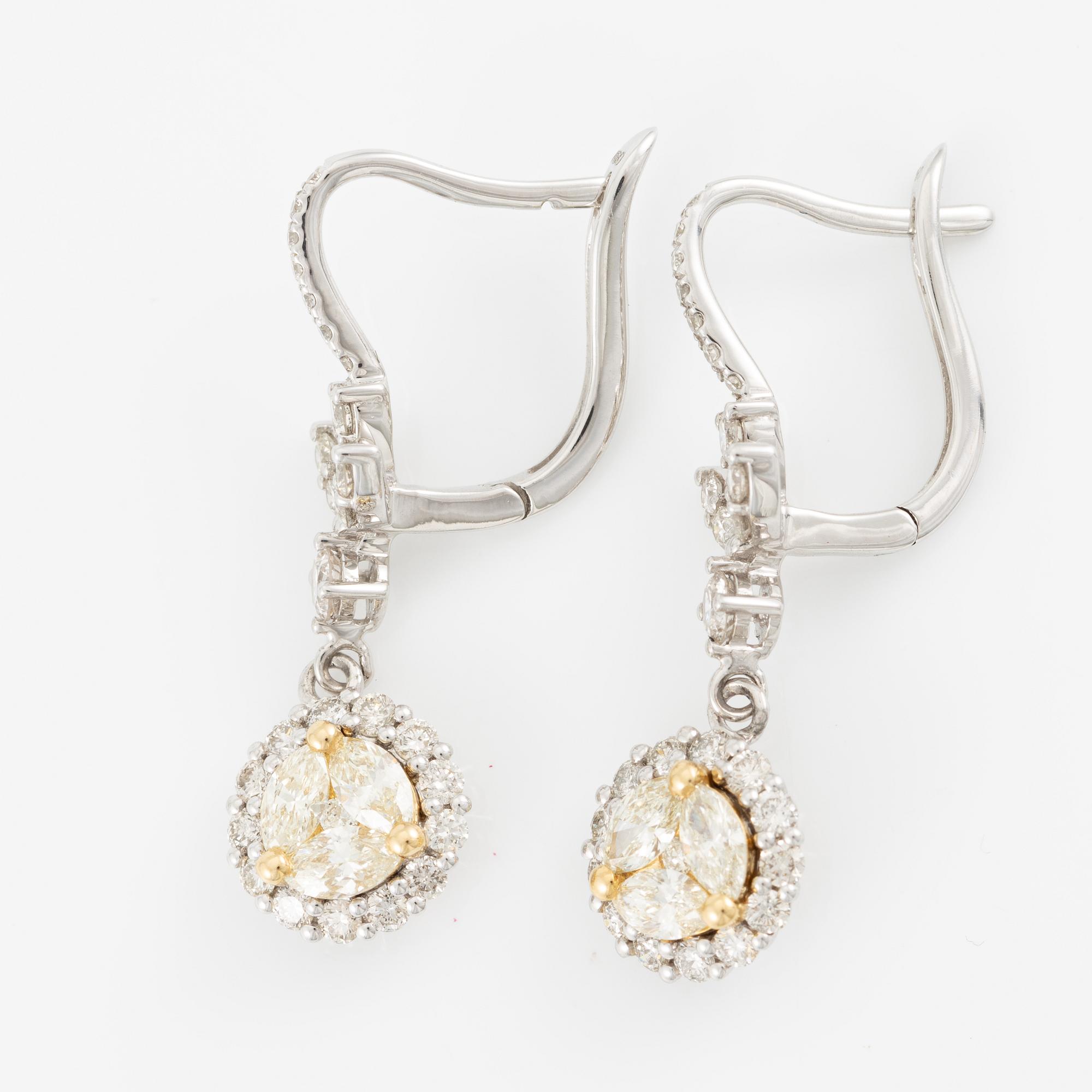 Earrings, 18K white gold set with round brilliant and yellow marquise-cut diamonds.