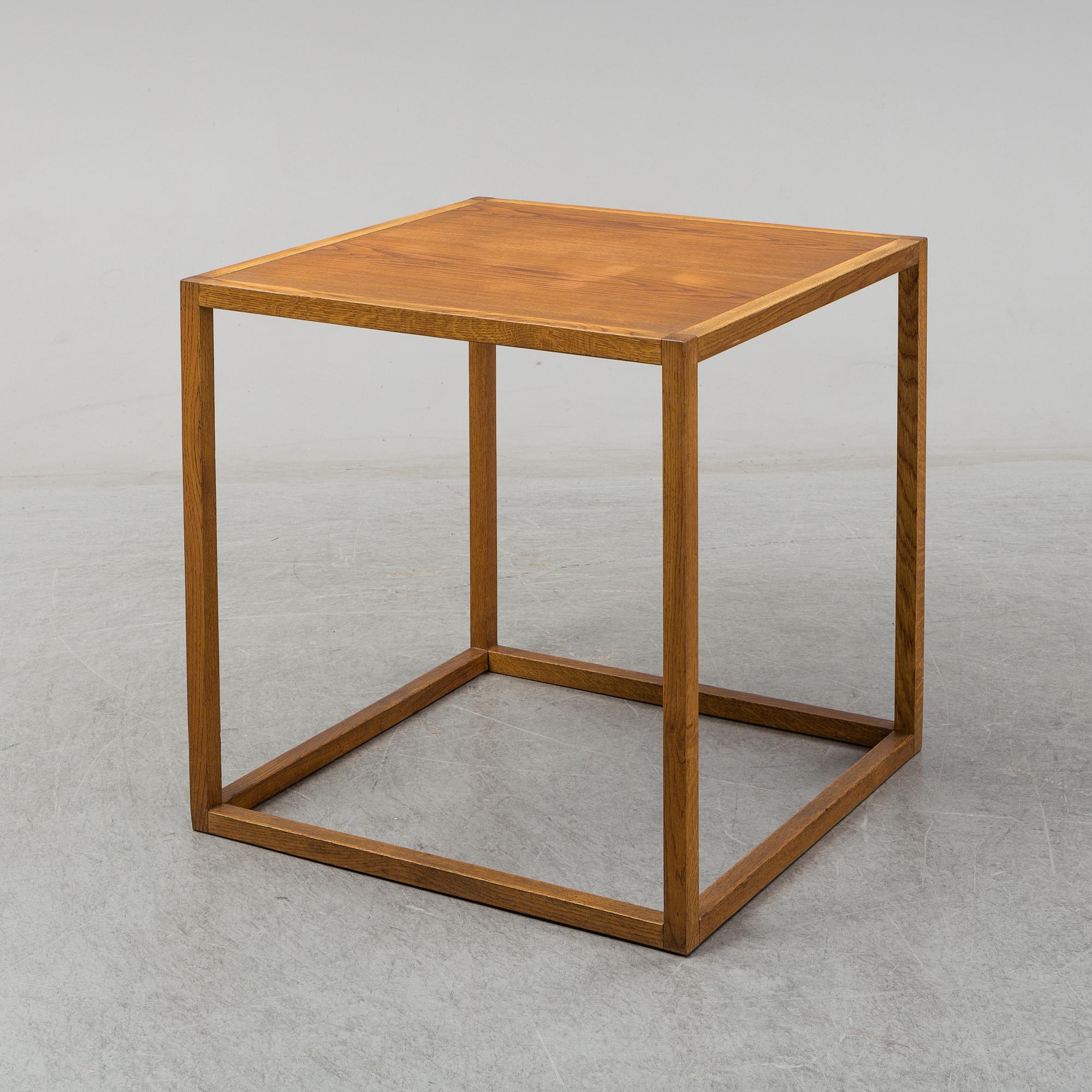MARIO PRANDINA, an oak table and four chairs, Plinio Il Giovane, Italy.