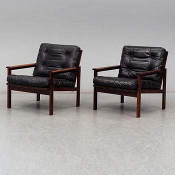 A pair of 'Capella' rosewood easy chairs by Illum Wikkelsø.