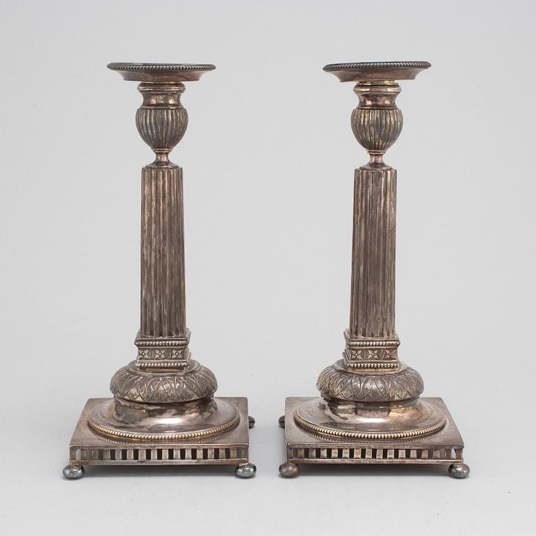 JACOB ENGELBERTH TORSK, a pair of Gustavian style silver candlesticks, Stockholm, 1898.