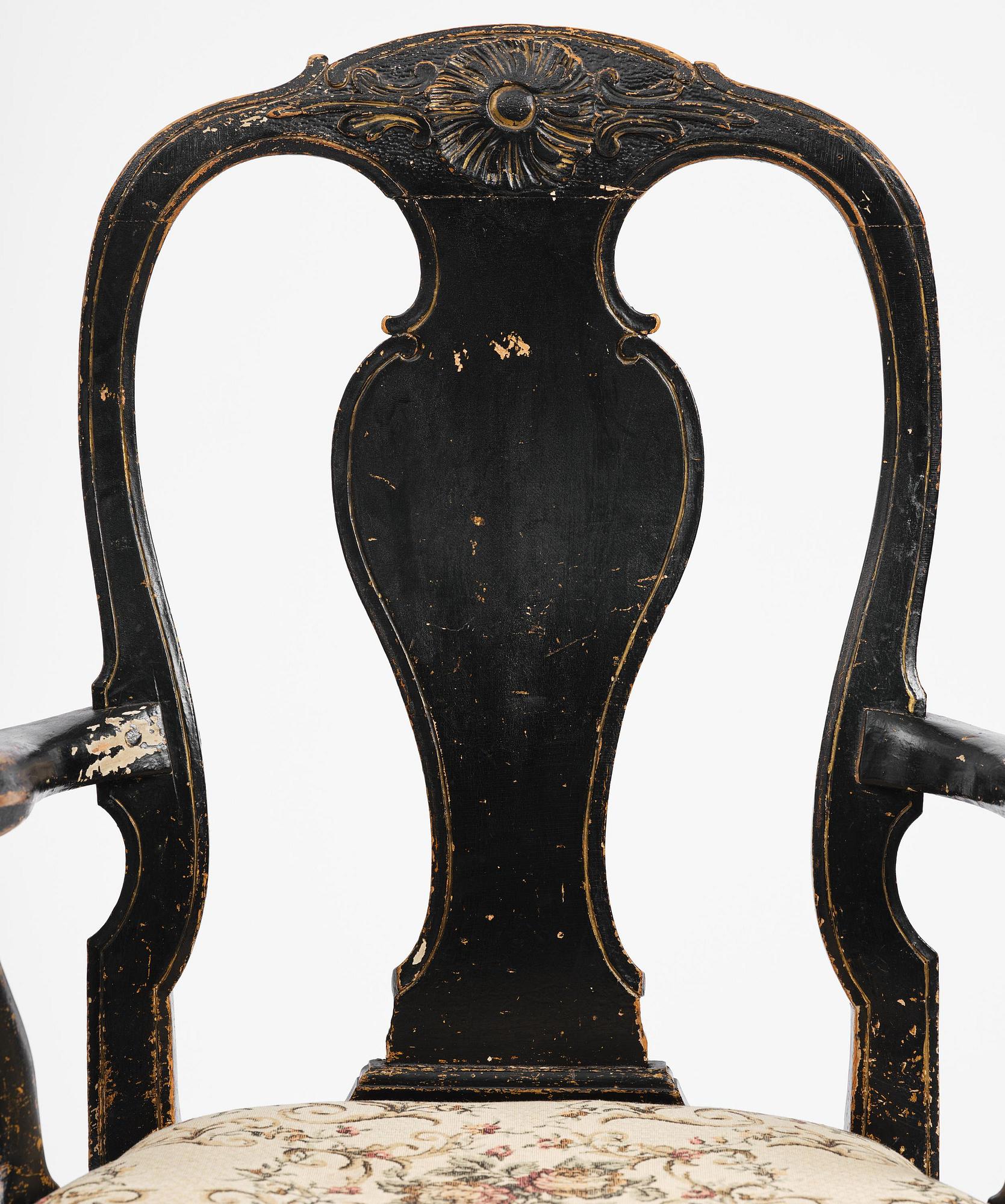 A pair of rococo armchairs in the manner of C. M. Sandberg, later part 18th century.