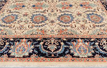 A Heris carpet, approx. 469 x 353 cm.