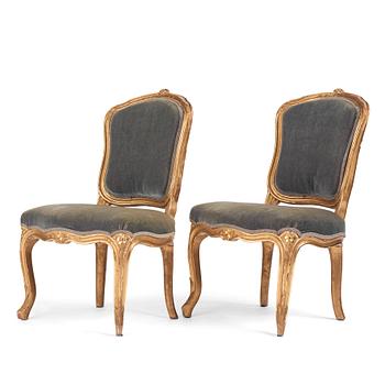 A pair of Swedish giltwood Rococo chairs, later part of the 18th century.
