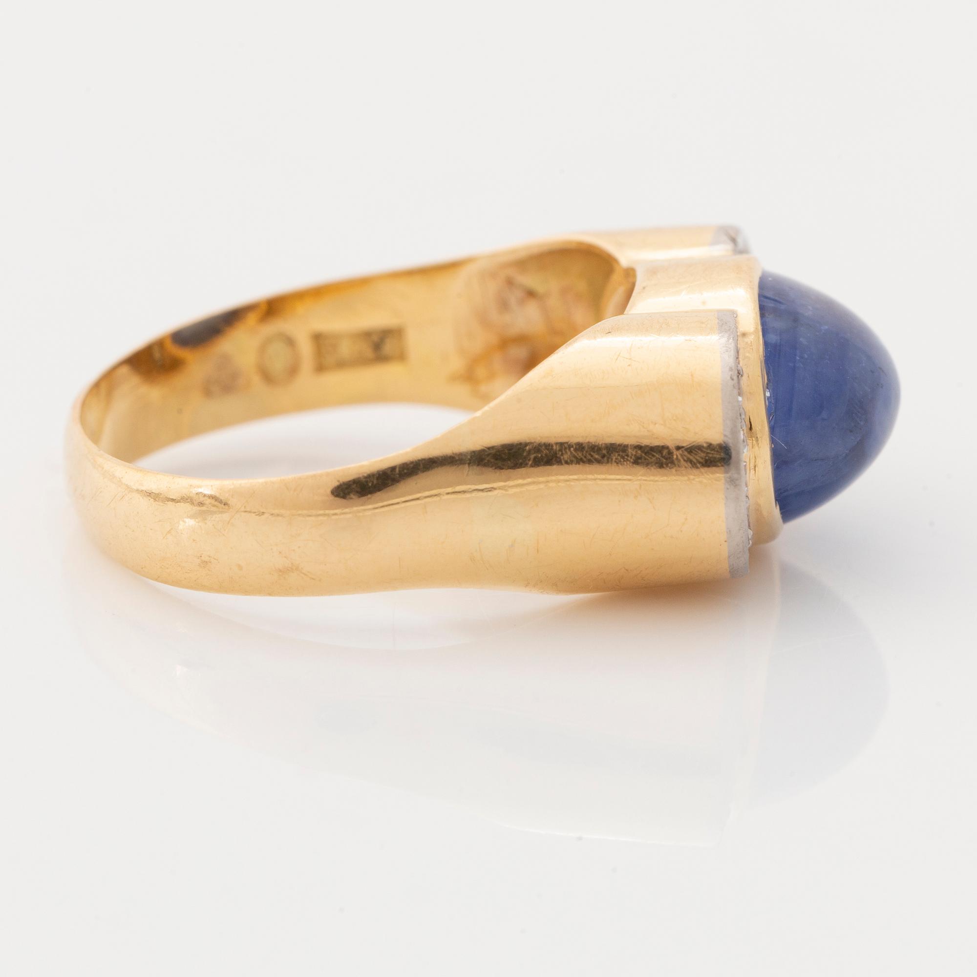 Cabochon cut sapphire and eight cut diamond ring.