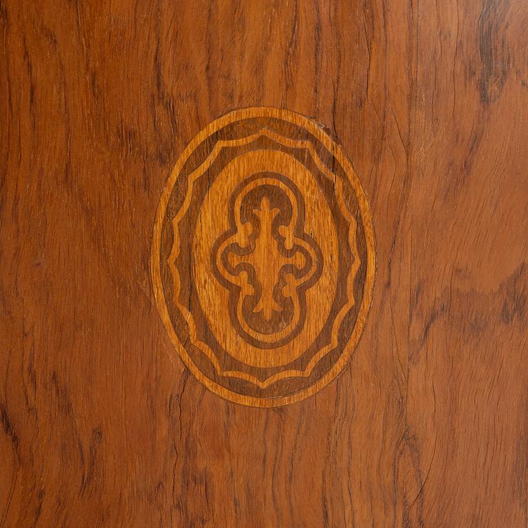 A small cabinet with drawers from around the year 1900.