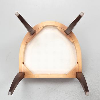 Attila Suta, eight armchairs.