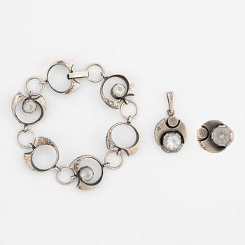 Karl Laine, ring, pendant, and bracelet, silver with rock crystal.
