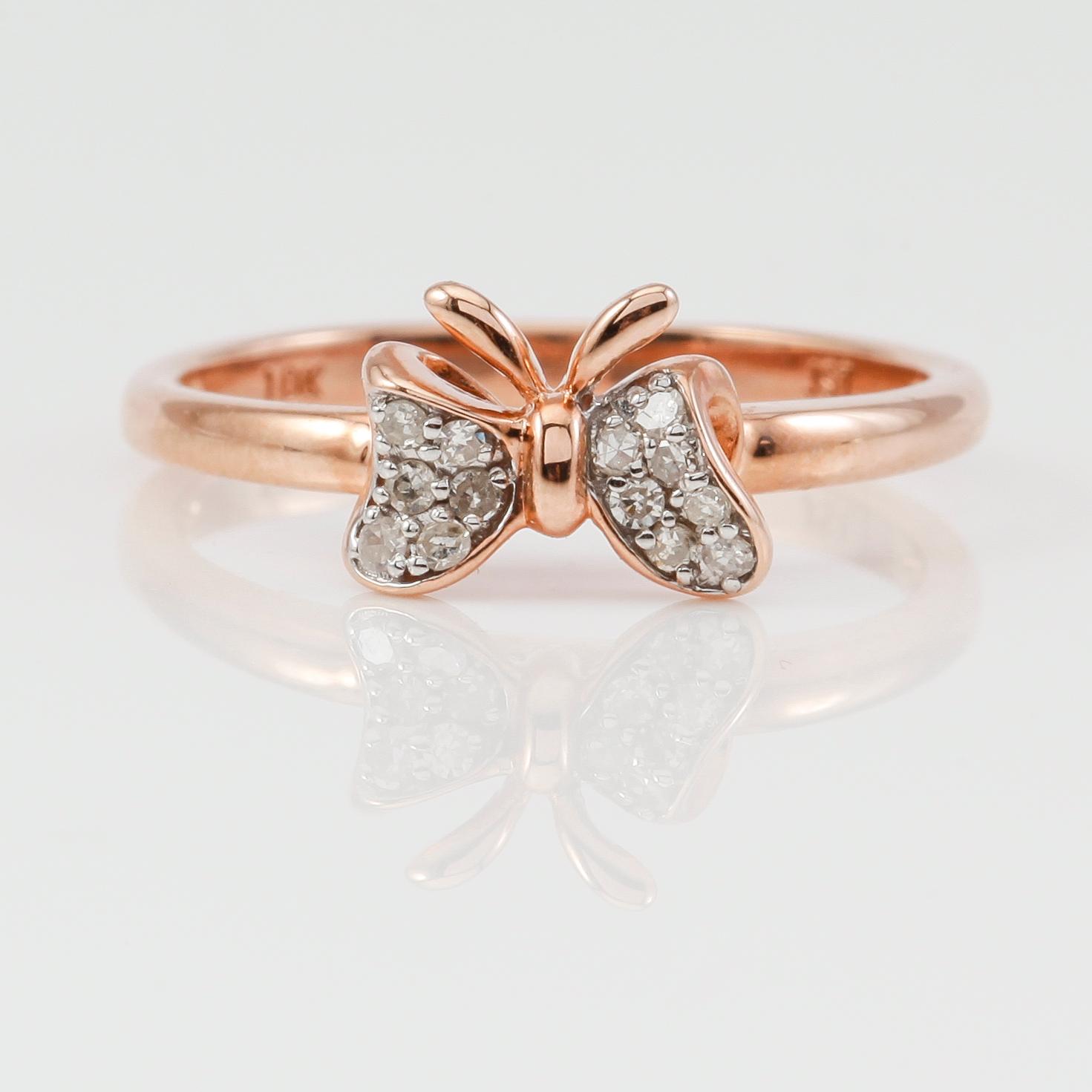 RING, 10K roséguld och diamanter tot ca 0.10 ct.