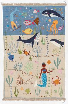 A hand-embroidered Kelim rug, 185 x 122 cm.