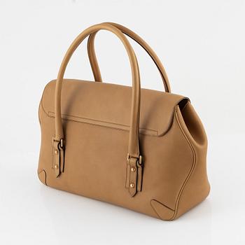 Gucci, a tan leather handbag, 2004.