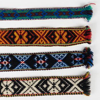 Twelve woven multicoloured bands, 20th Century.
