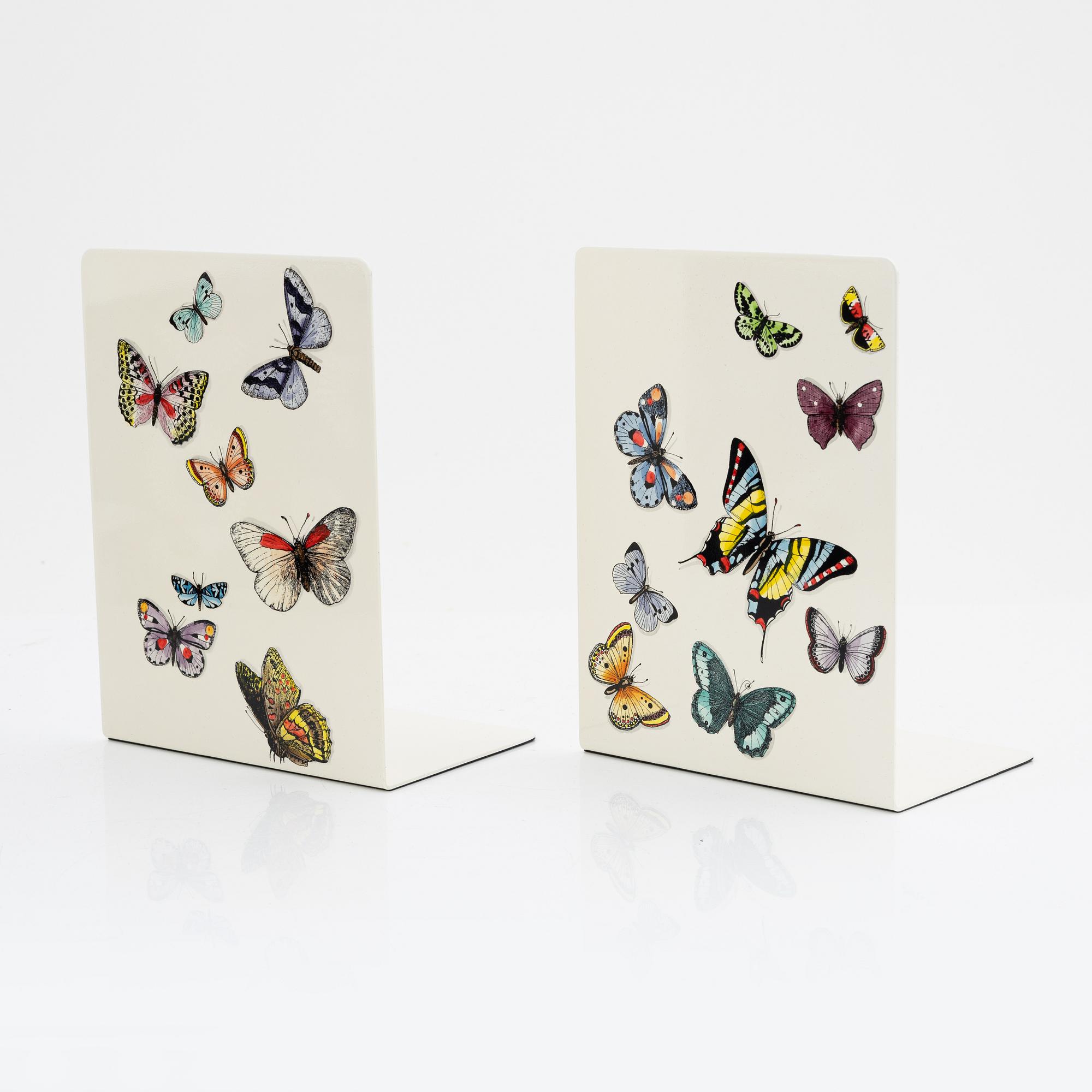 Piero Fornasetti, a pair of metal book stands.