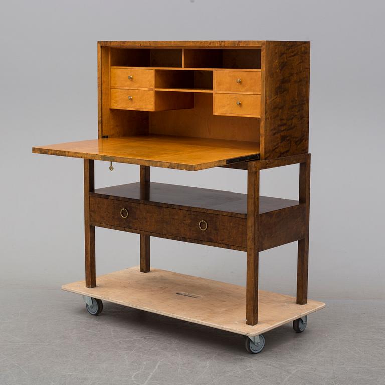 a mid 20th century birch bureau from Axel Larson, Bodafors, model number 954.