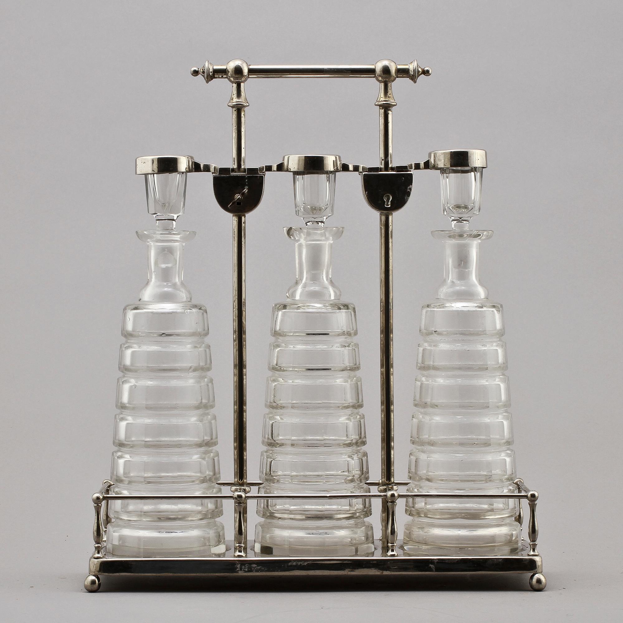 TANTALUS, nysilver samt glas, sekelskiftet 1900.