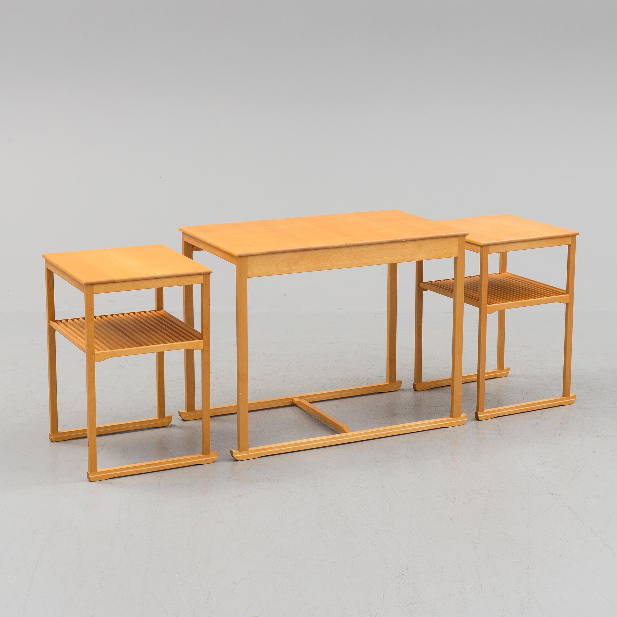 A Swedish Carl Malmsten "The Sled" birch side table nesting table i three parts, Åfors Möbelfabrik.