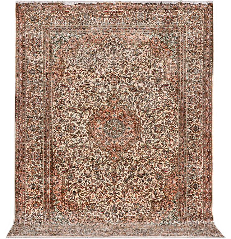 A carpet, silk Kashmir, ca 303 x 216 cm.