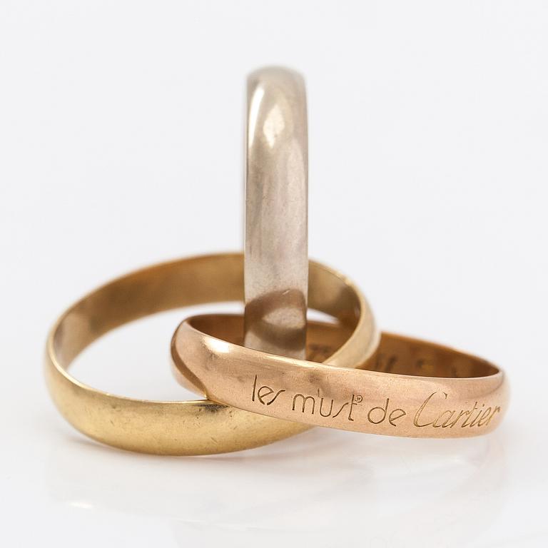 must de Cartier, An 18K gold "Trinity" ring.