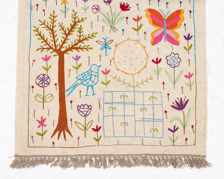 A hand-embroidered Kelim runner, c. 292 x 85 cm.