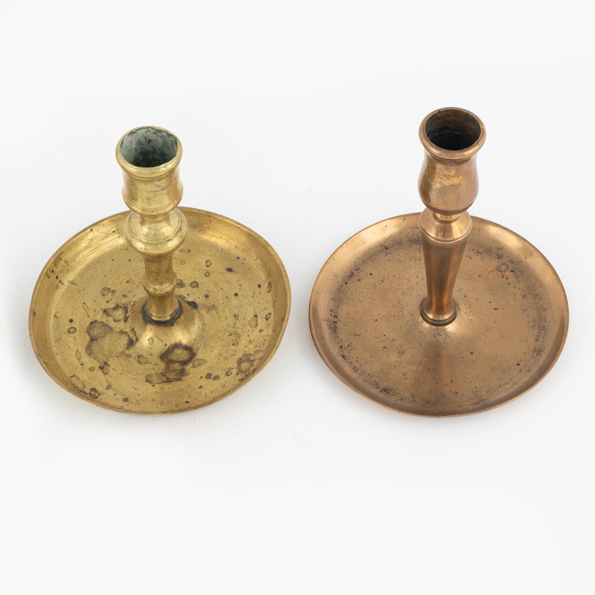 Four bronze candlesticks, a pair of which Skultuna model N 60, 18th-19th Century.