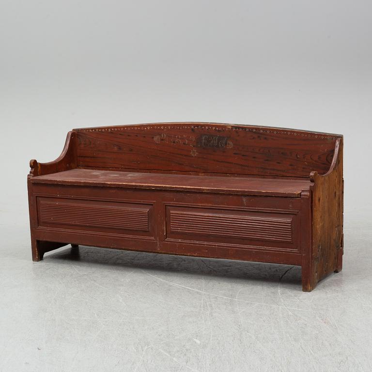 A 19th century painted wood sofa.