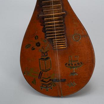 A Chinese wooden 'Pipa'/'flute' musical instrument, 20th century.