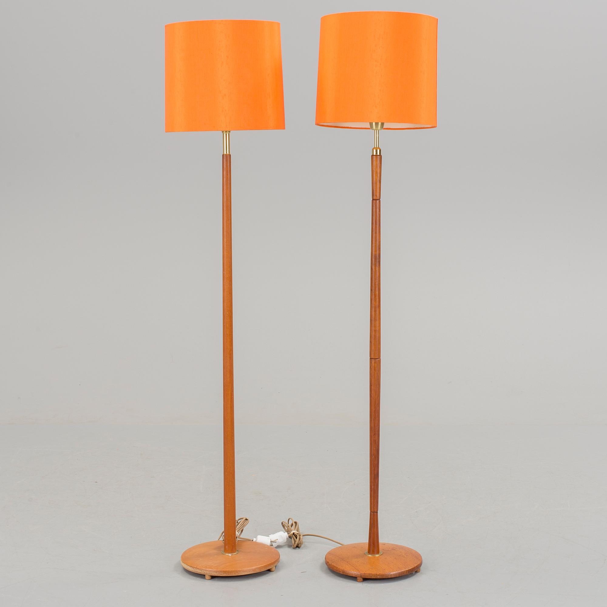 Two floor lamps in teak and brass from the 1960s/70s.