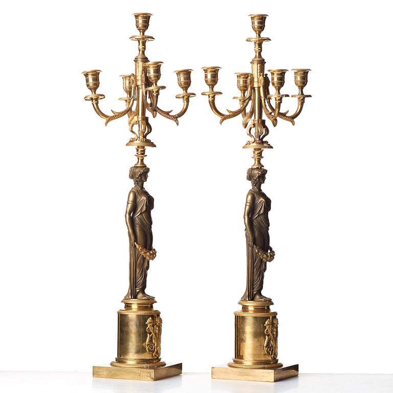 A pair of Empire 19th century five-light candelabra.