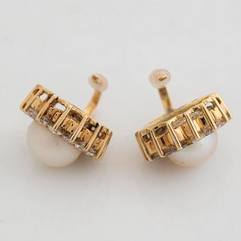 Cultured pearl and brilliant cut diamond earrings.