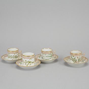 A set of three plus one porcelain "Flora Danica" coffee cups and saucers, "Royal Copenhagen, Denmark.