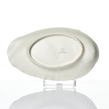 Wilhelm Kåge, 15 pieces of "Carrara" and "Gold Carrara" stoneware dishes, Gustavsberg, Sweden, 1930s/40s.