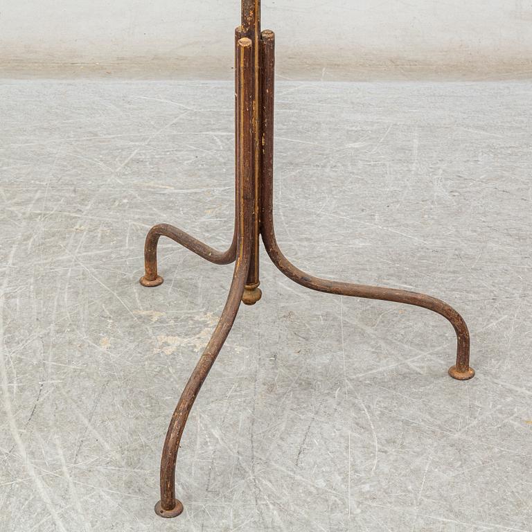 An iron clothes hanger, circa 1900.