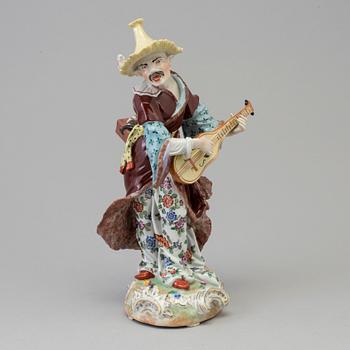 A large Chinoiserie porcelain figure, Germany, Sächsische PF zu Potschappel, 20th Century.