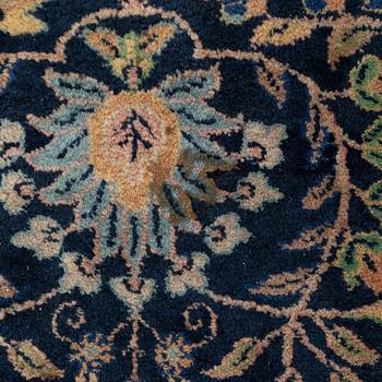 An India Carpet, c. 380 x 285 cm.