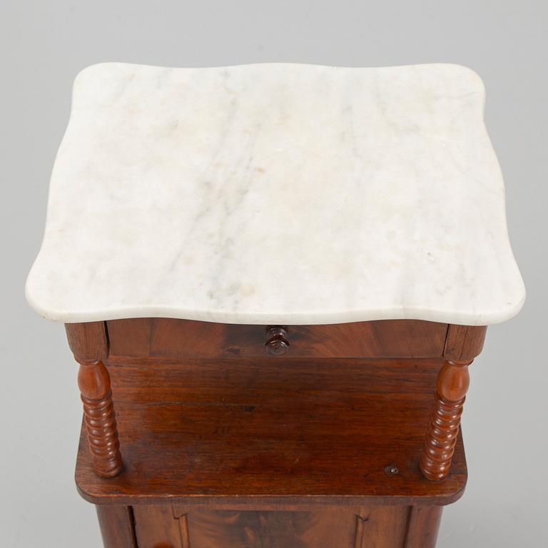 An early 20th century bedside table.