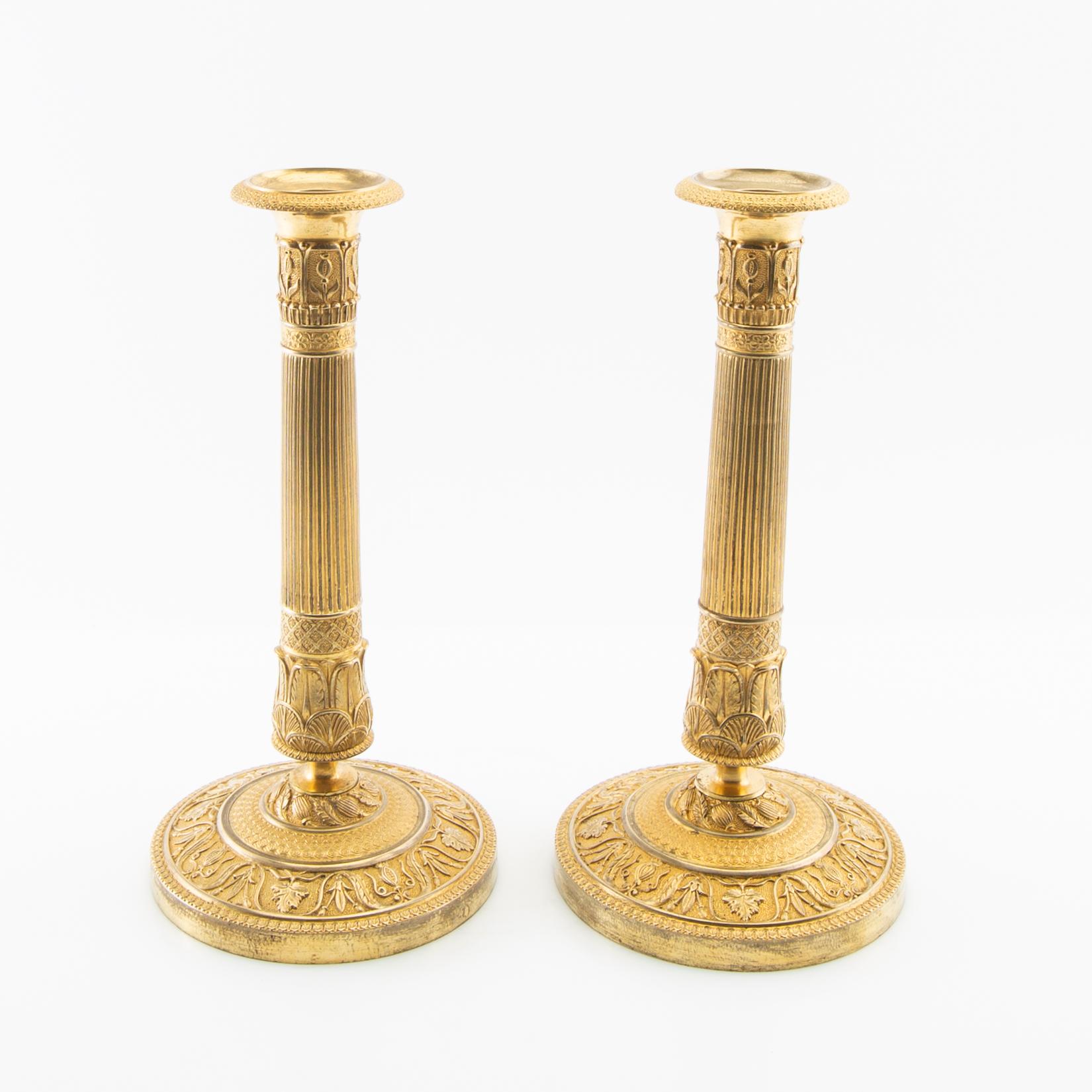 A pair of candlesticks, Empire France first half of the 19th century.