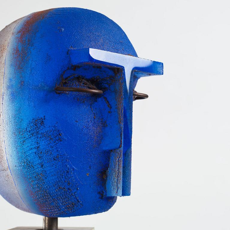 Bertil Vallien, a unique sand casted blue glass 'Head' sculpture on a hewn and polished limestone plinth, Kosta Boda, Sweden.