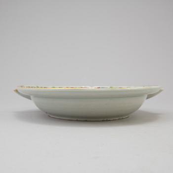 Three chinese famille rose dishes and one hot water dish, 18th and 19th century.