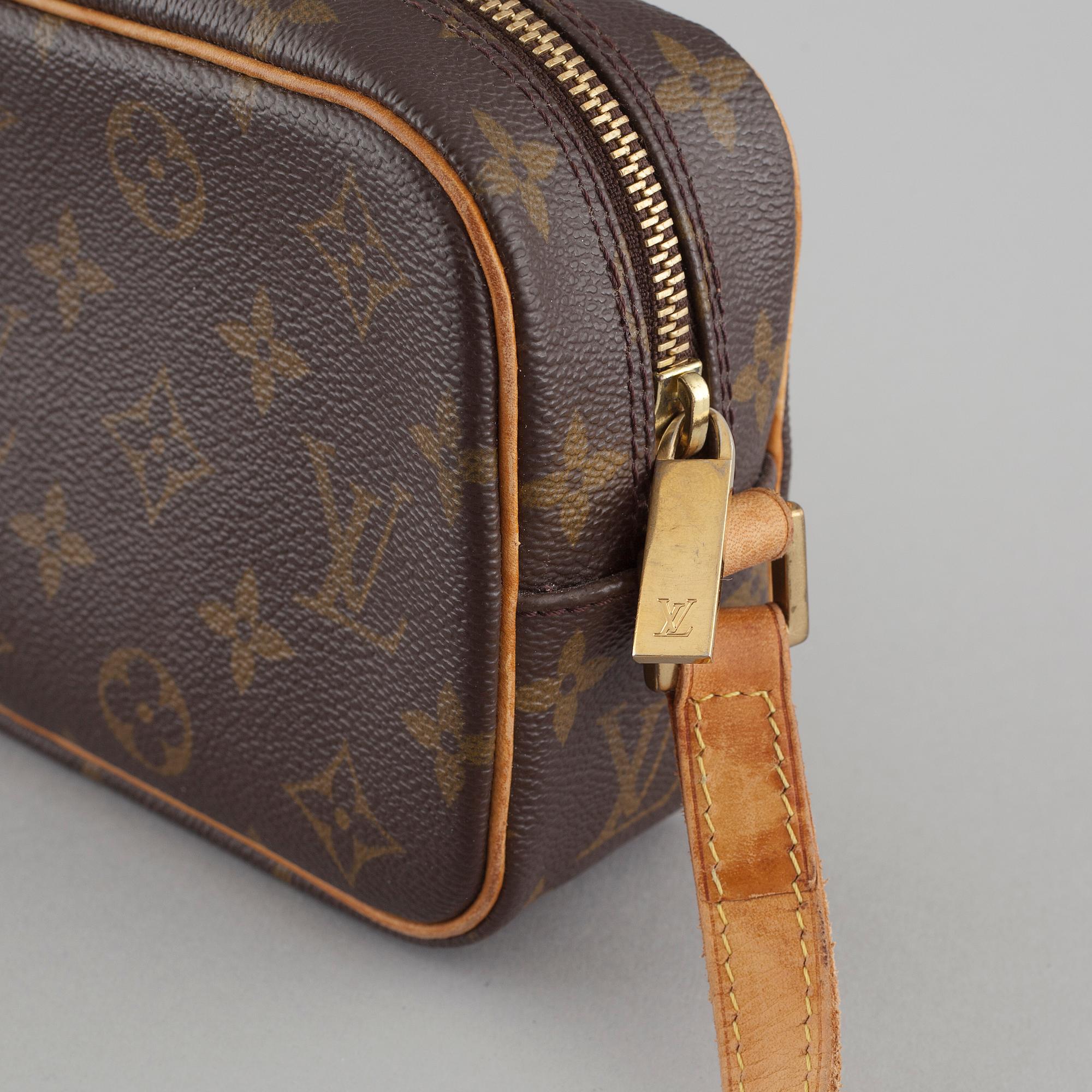 LOUIS VUITTON, a bag.