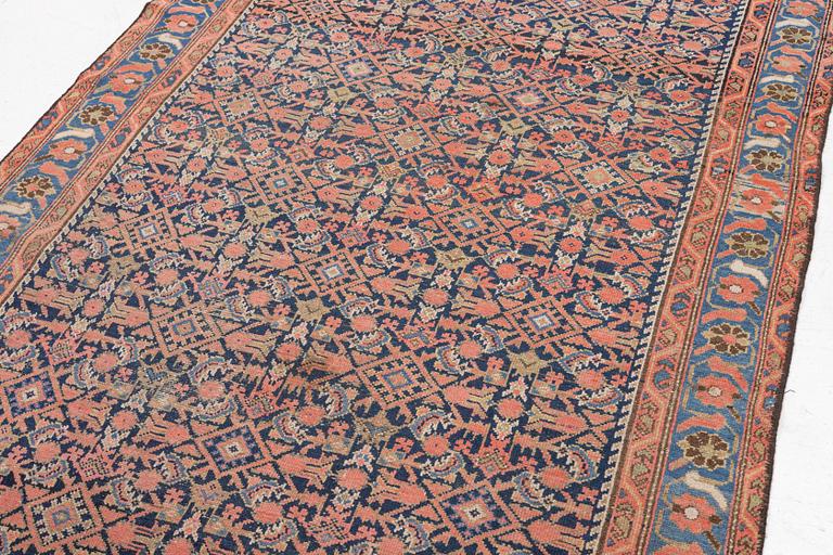 An antique Malayer carpet, west persia c 289 x 149 cm.