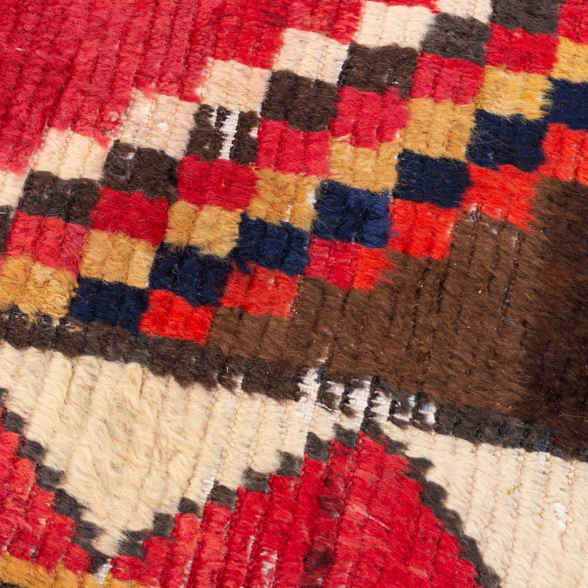 A semi antique Khersake-Bakhtiarirug, c. 282 x 153 cm.