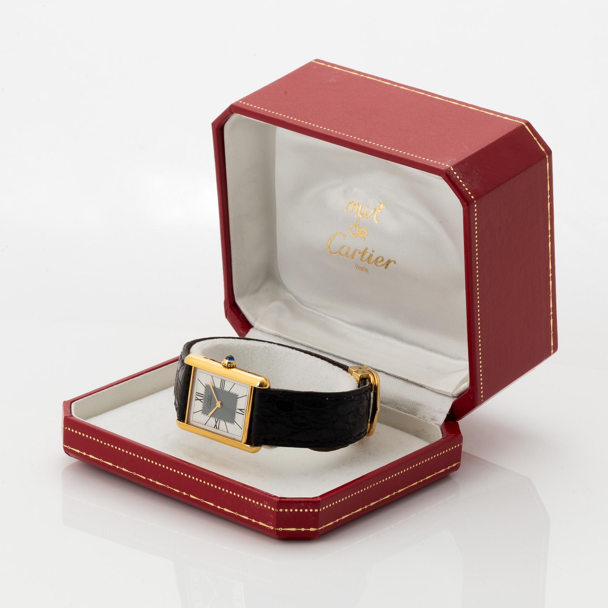 must de CARTIER, Tank, armbandsur, 23 x 23,5 (30,5) mm.