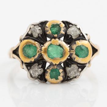 Ring 18K gold and silver set with old-cut diamonds and green stones.