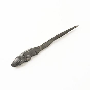Firma Svenskt Tenn, a pewter hand mirror model A 1497 and a letter opener in the shape of an alligator, Stockholm, 1930s-40s.