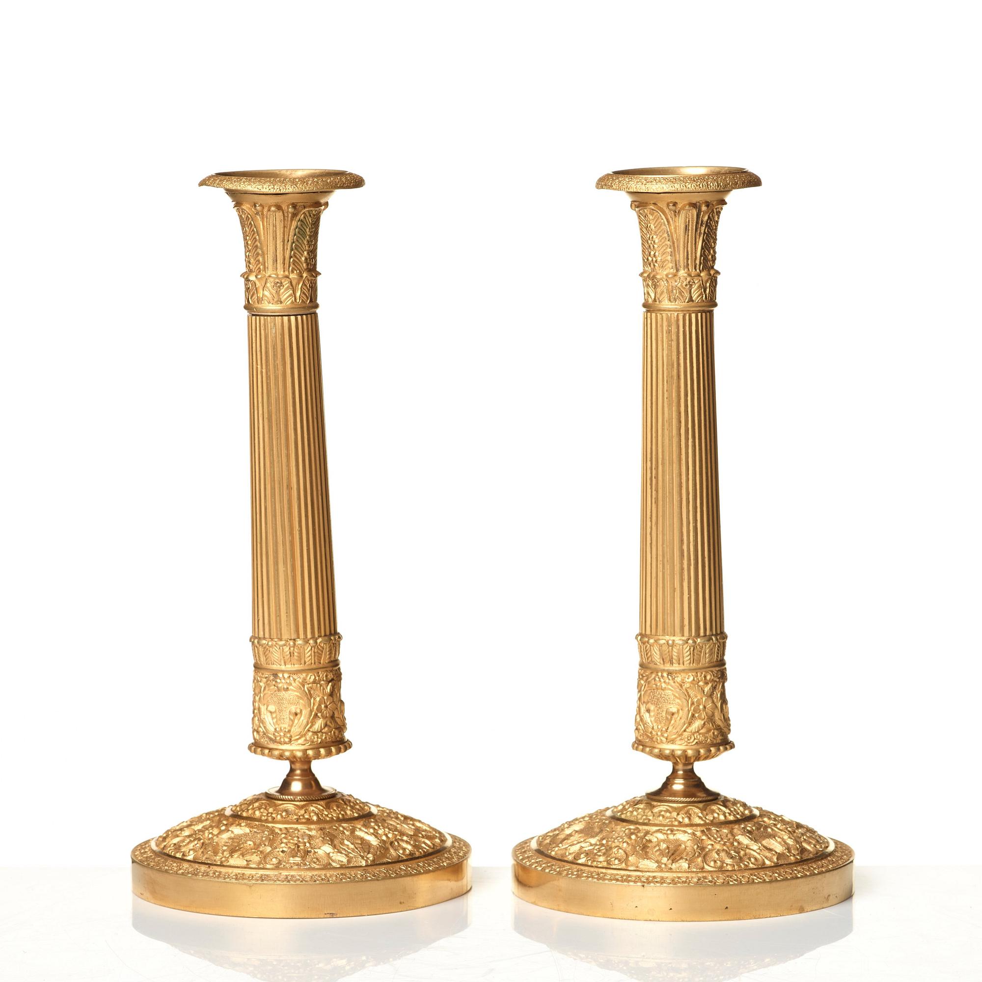 A pair of Empire candlesticks.