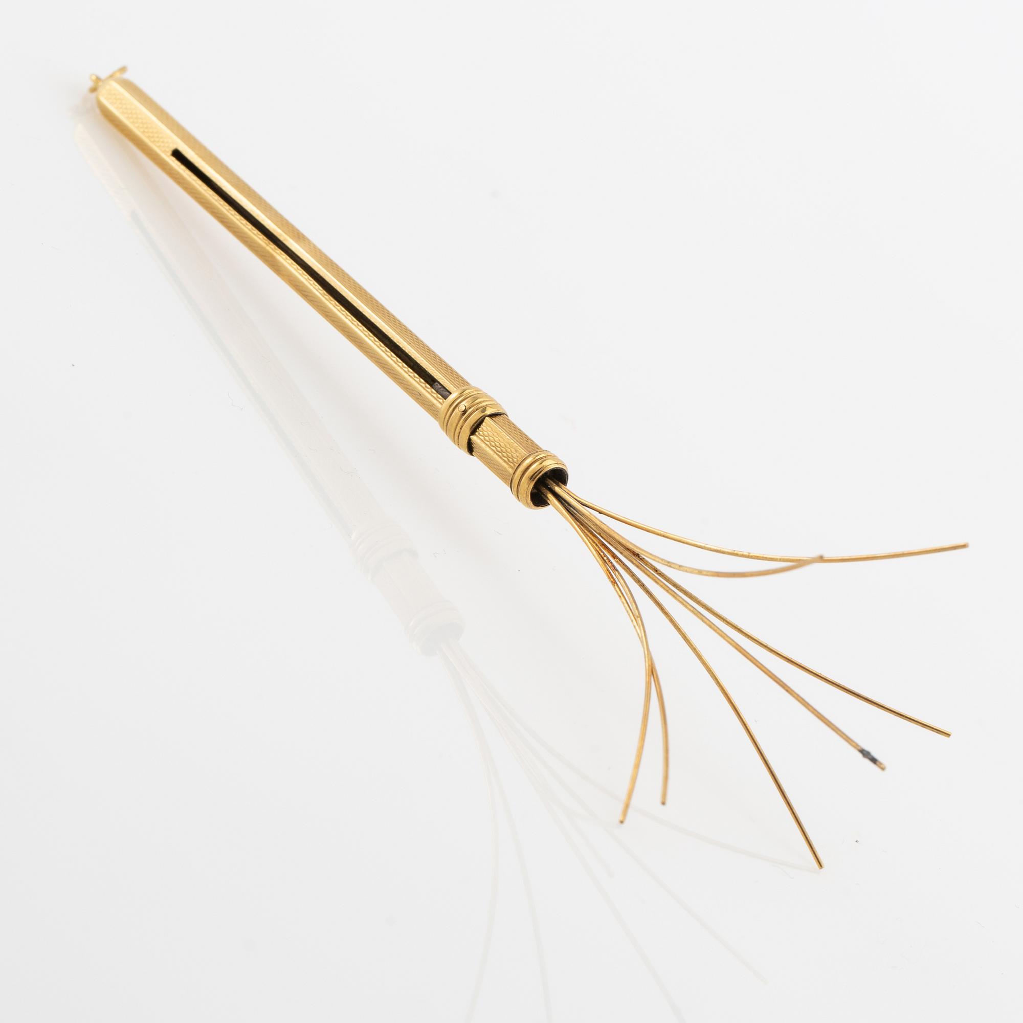 Champagne whisk 18K gold.