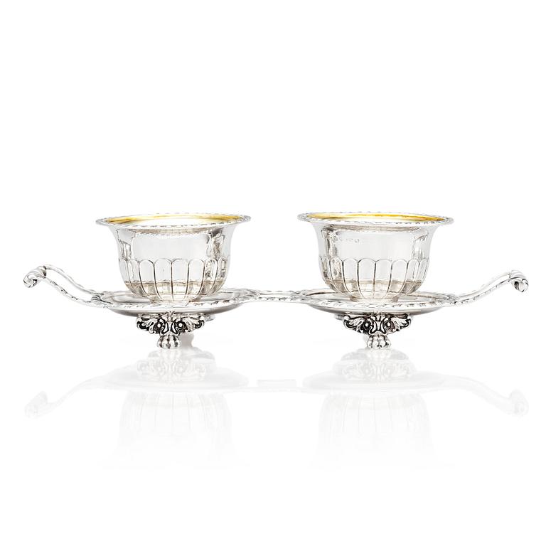 A pair of Swedish candy bowls with stand, parcel-gilt silver, mark of Gustaf Möllenborg, Stockholm 1851.