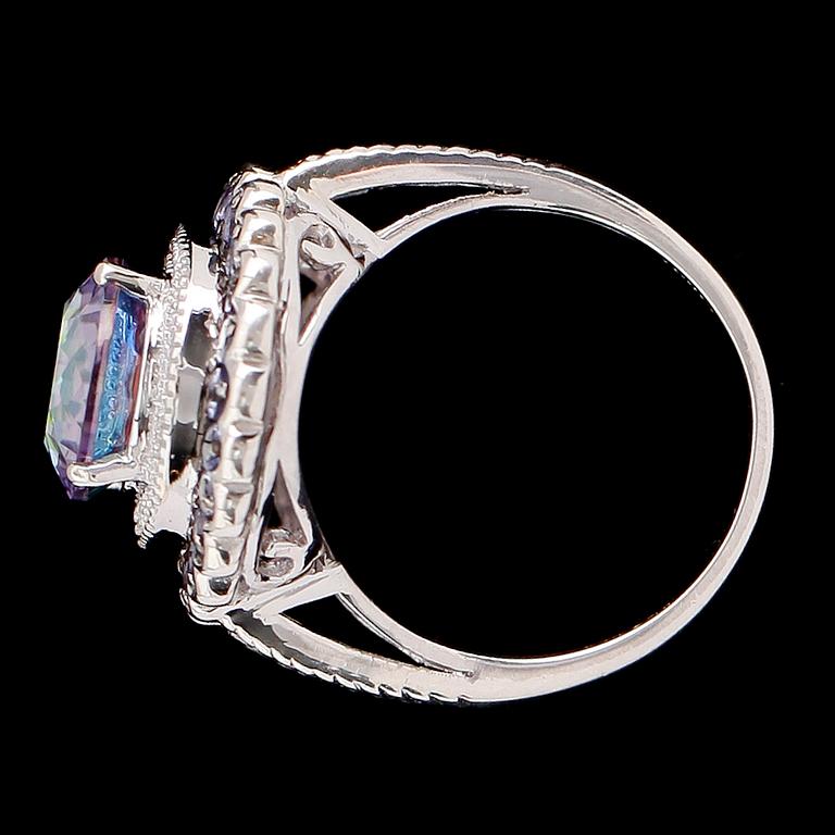 RING, sterlingsilver, blå tanzaniter tot ca 1.50 ct, färgad topas ca 5.00 ct.