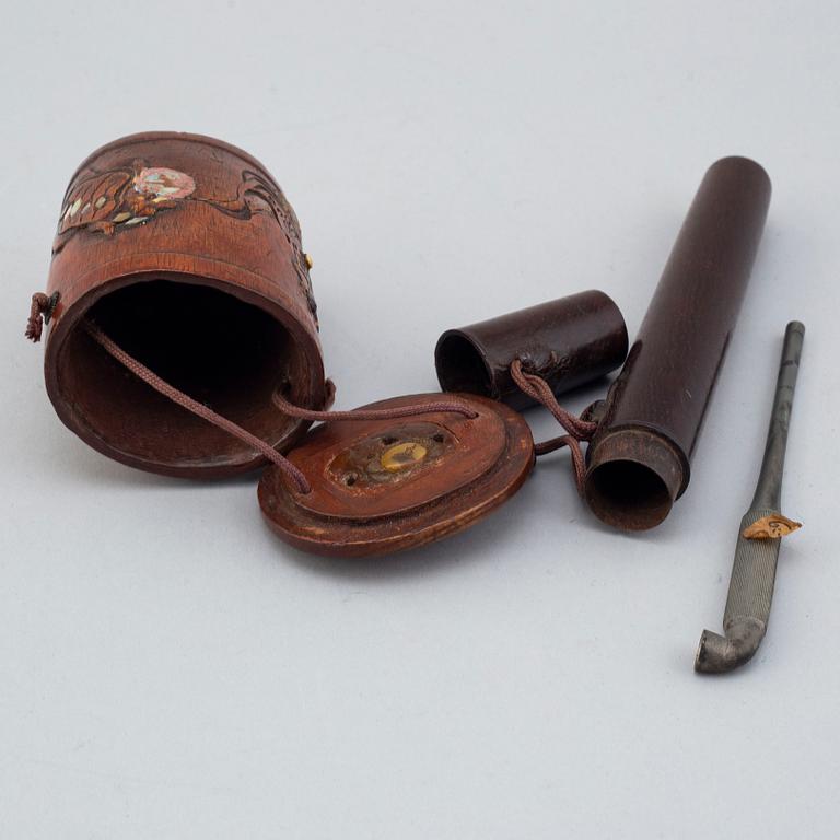 A group of chinese pipes and boxes, China, 20th Century.